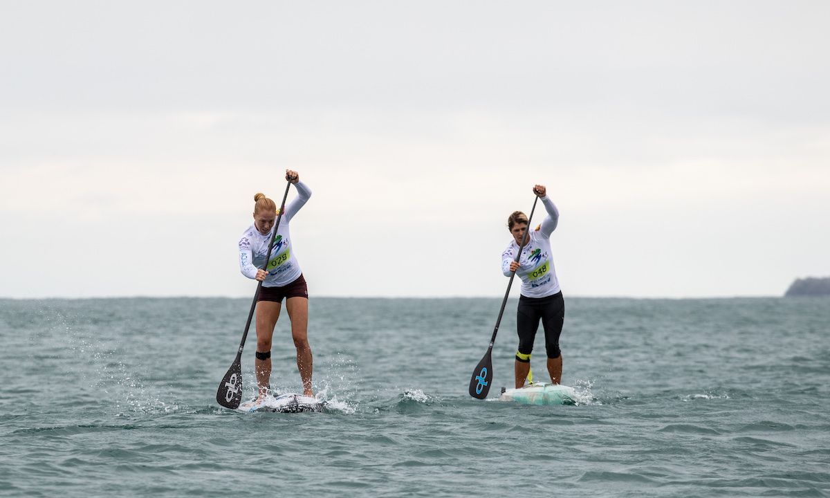 Candice Appleby (left) on her way to taking Gold in the Technical Race at the 2018 ISA World SUP and Paddleboard Championship in Hainan, China. Photo: ISA / Pablo Jimenez