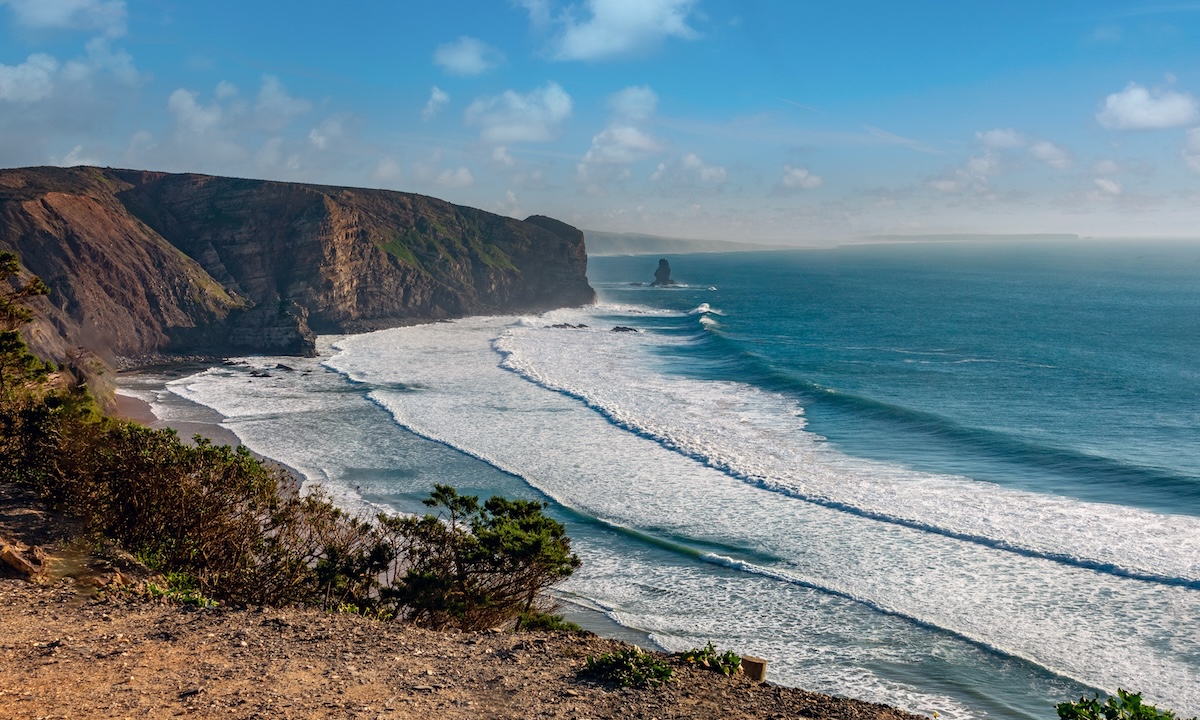 best places paddleboard algarve portugal arrifana beach