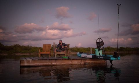 Corey Cooper enjoying sunset from the BOTE House Belize. | Photo Courtesy: BOTE / Sean Murphy