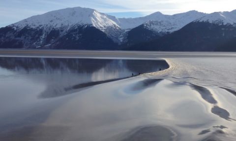 Paddle Boarding The Tidal Bore In Turnagain Arm, Alaska