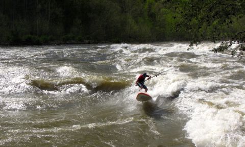 Spenser Lacy surfing the New River Dries on the Badfish River Surfer. | Photo: Randy Fisher