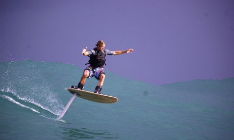 Laird Hamilton, foil boarding. | Photo Courtesy: gabbyandlaird.com