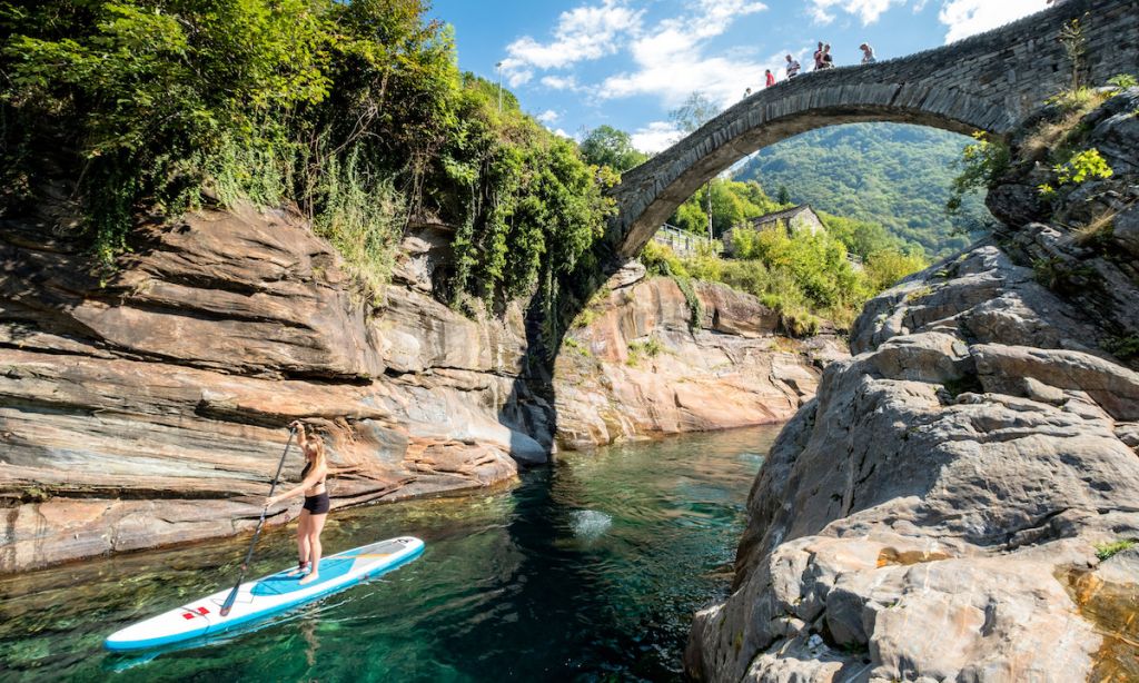 A paddler goes through the Ponte dei Salti in Lavertezzo, Switzerland. | Photo courtesy: Nicholas Spooner