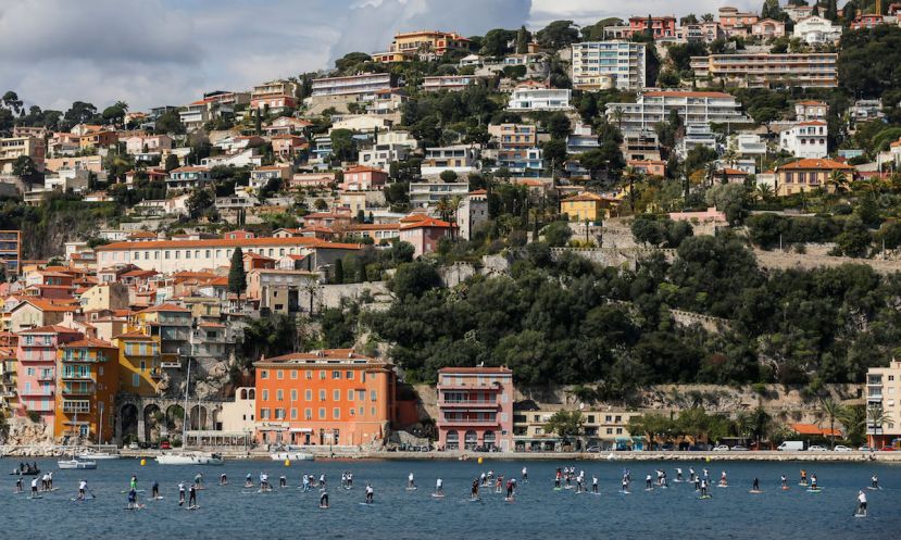 Racers paddle towards the beach at the inaugural Villefranche Paddle Race. | Photo Courtesy: Timothe Renaud